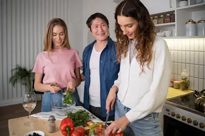 Familia cocinando juntos con vegetales